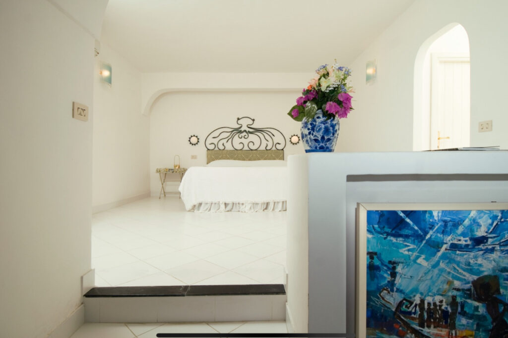 balinese painting and king bed